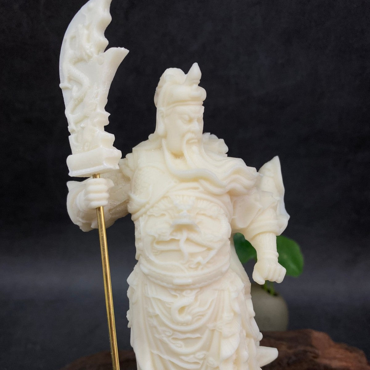 Detailed ivory nut Guan Yu warrior sculpture with armor, beard, robe folds and guandao