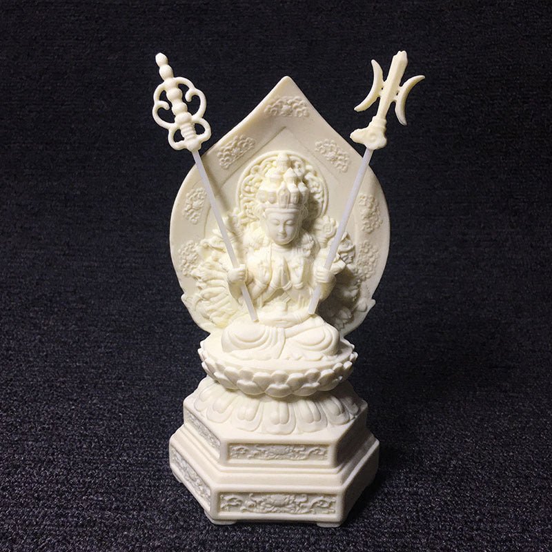 Ivory nut Thousand-Hand Guanyin seated on lotus pedestal with ornate mandorla and ritual implements
