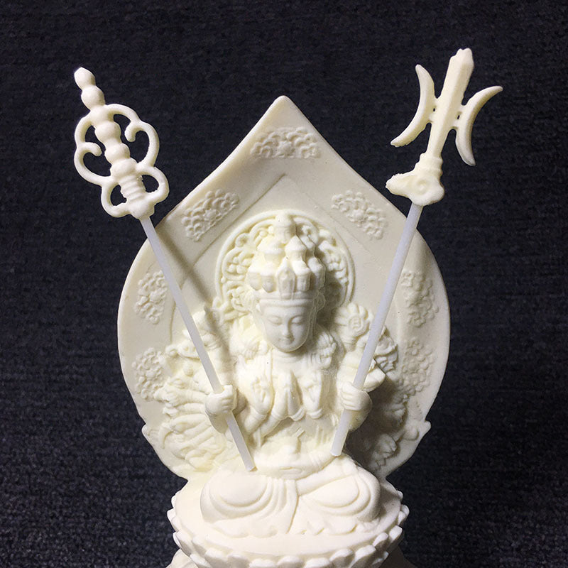 Ivory nut Thousand-Hand Guanyin statue side view with layered lotus base and carved halo