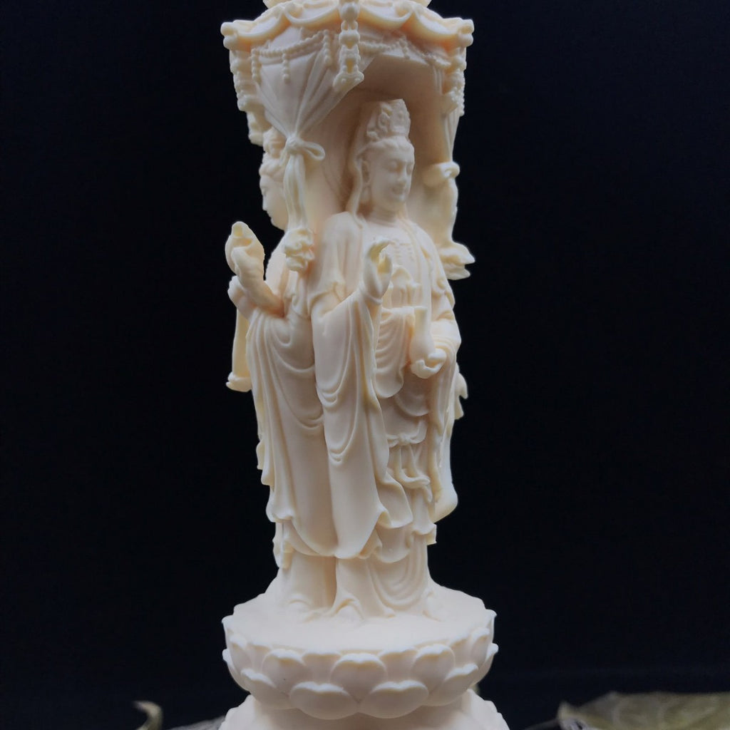 Ivory nut Amitabha triad pagoda ornament with detailed robes, lotus base and canopy