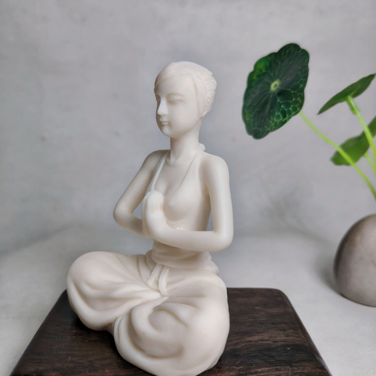 Ivory nut yoga meditation woman figurine side angle with prayer hands