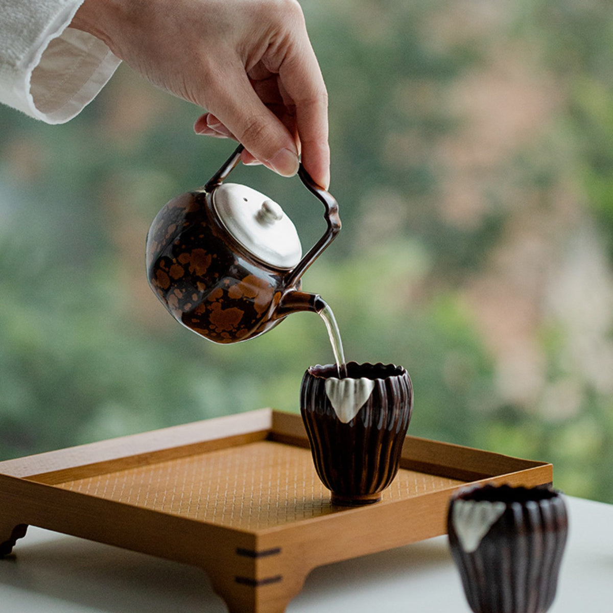 130ml kiln-transformed ceramic lift-handle teapot pouring Chinese tea