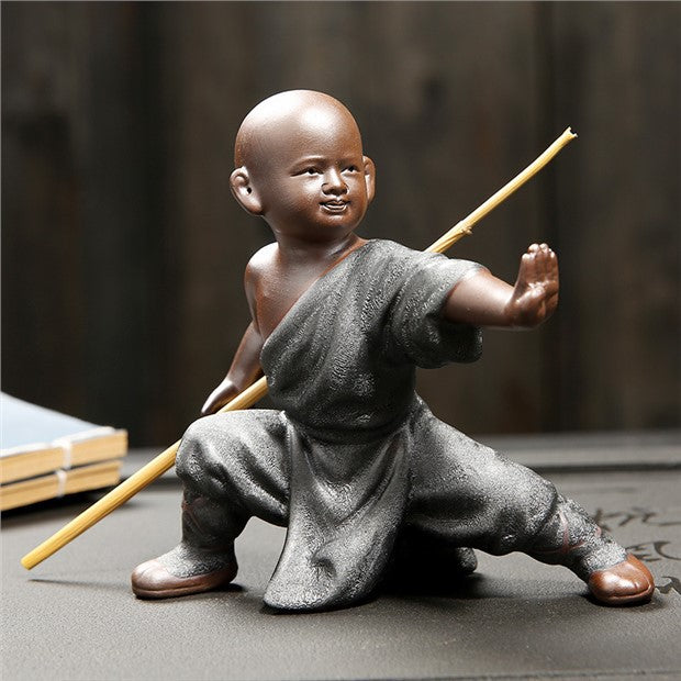 Charcoal robe Kung Fu monk tea pet with staff for tea table decor