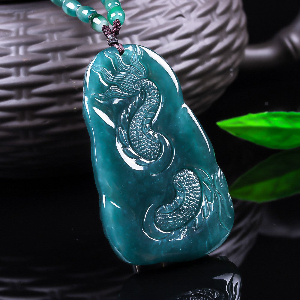 Large blue green jadeite dragon relief carving close-up