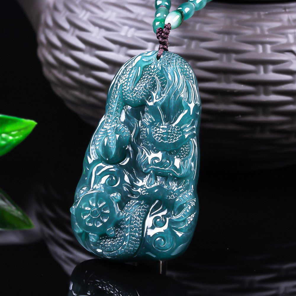 Substantial carved jadeite dragon pendant side profile and polish