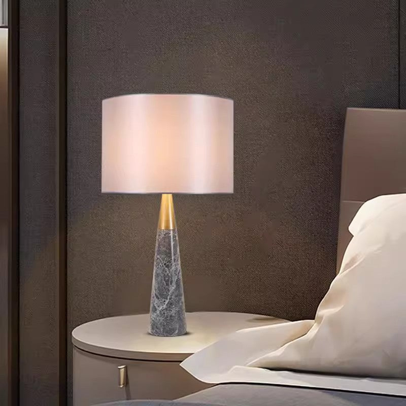 Large grey marble tapered table lamp with brass neck and grey shade