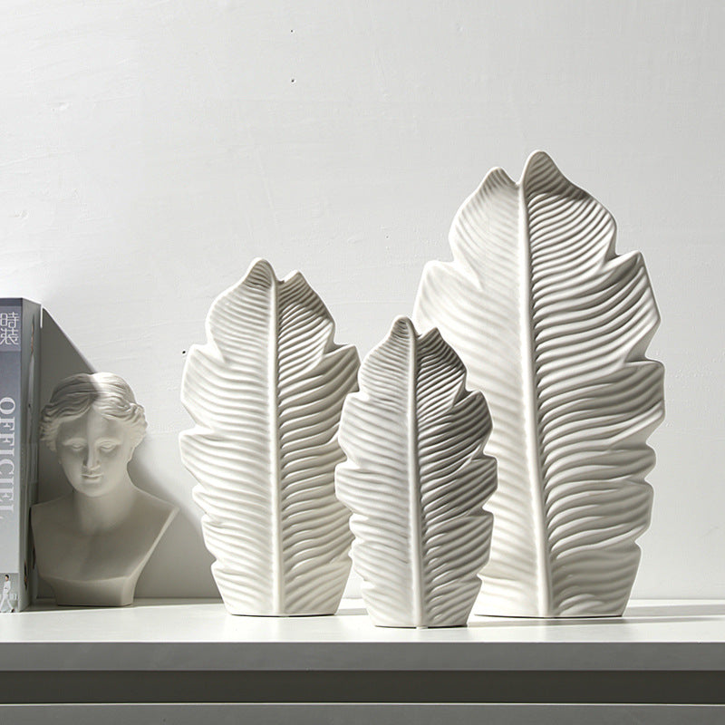 White sculptural leaf ceramic vase trio for modern interior decor