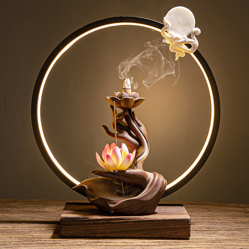 Pink lotus incense burner with LED circle light for spiritual home decor