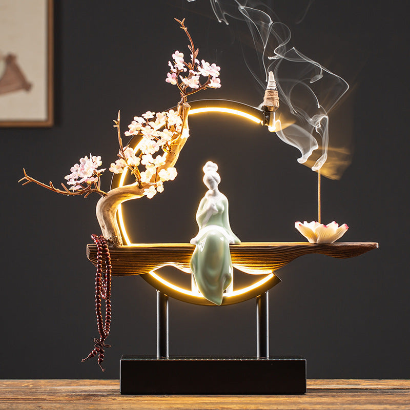 Elegant Chinese beauty incense burner with illuminated crescent ring and floral branch