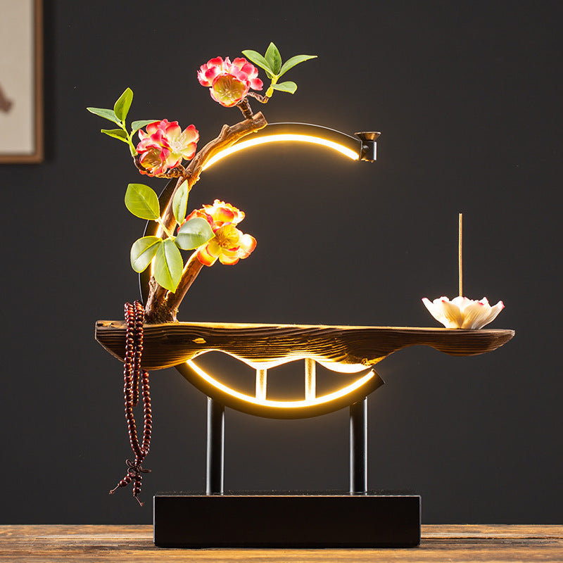 LED ring floral incense ornament with lotus ash holder and warm ambient light
