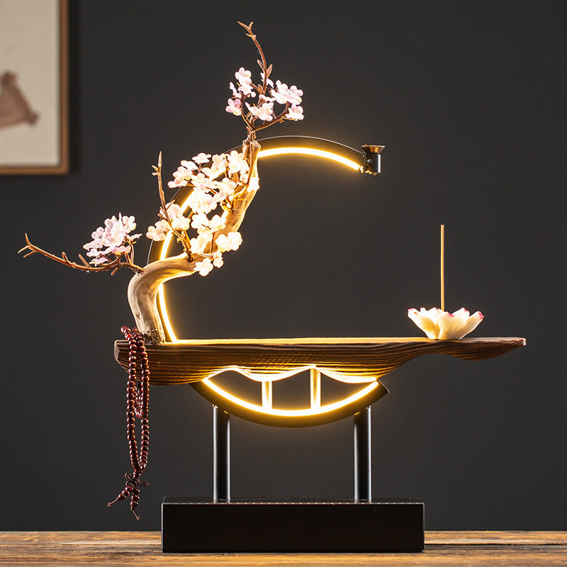 Plum blossom illuminated incense sculpture with classical beauty and lotus burner