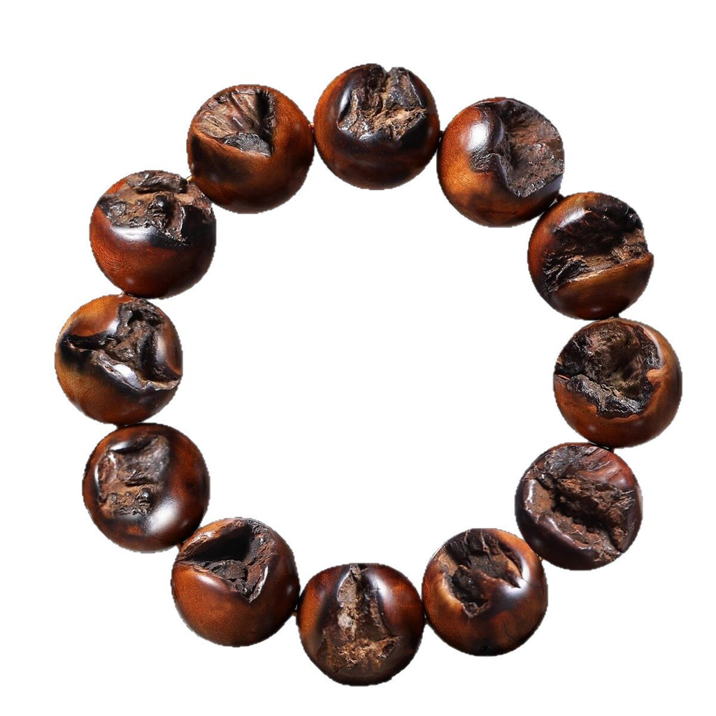 Supplier-described Lei Ji Zao wood bead bracelet with natural lightning-scar-style cavities and dark brown polished grain