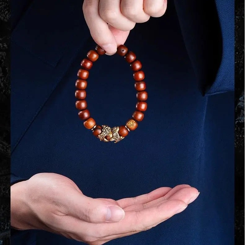Lei Ji Zao wood old-style barrel bead bracelet with Pixiu-style focal charm