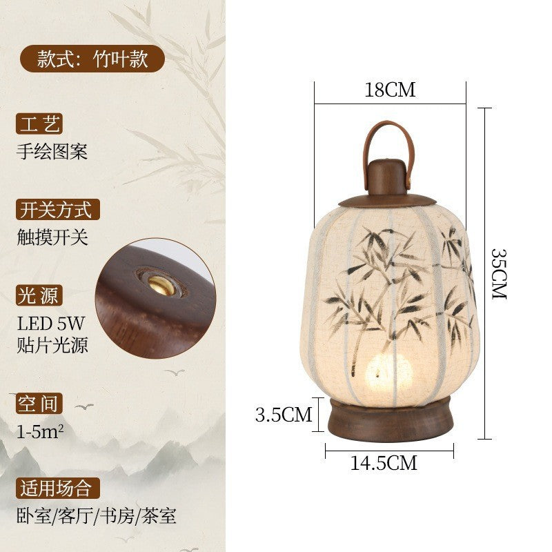 Bamboo linen lantern lamp measuring approximately 35 cm high and 18 cm wide