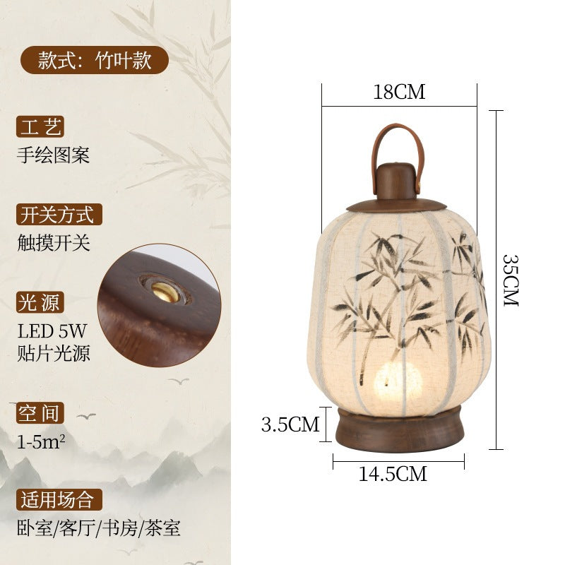 Bamboo print linen lantern lamp with wood handle and round base