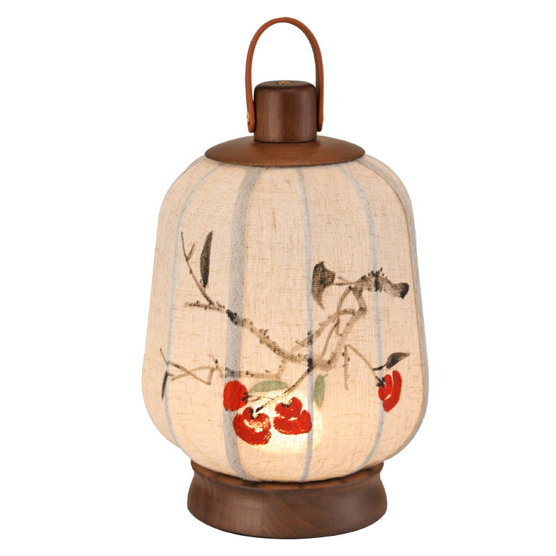 Persimmon linen portable lantern lamp with oak-tone top and handle