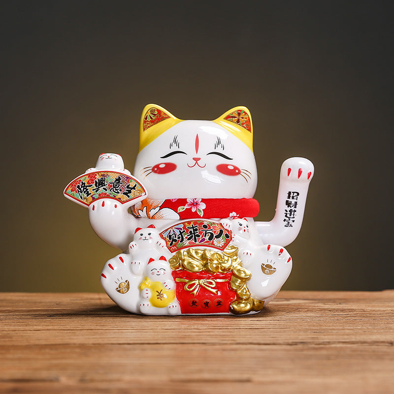 Front view of auspicious lucky cat figurine for home office and shop decor