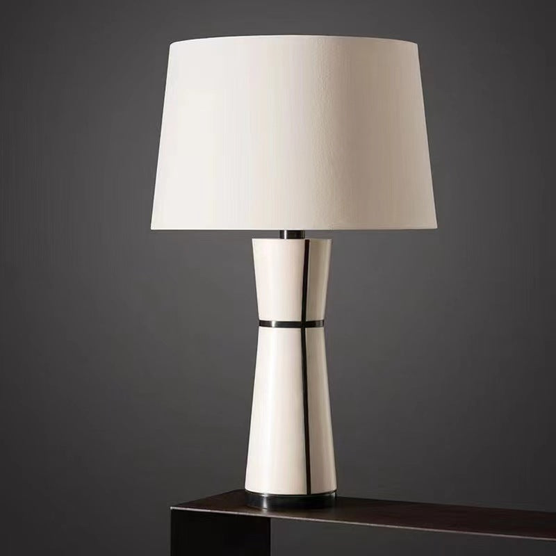 Luxury white leather table lamp styled on dark console