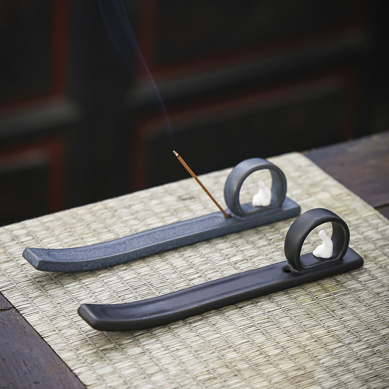 Blue-gray and matte black minimalist Buddha incense trays displayed together