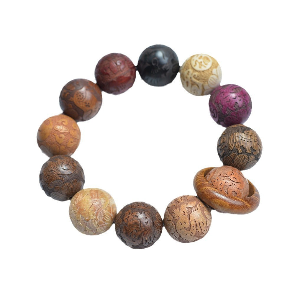 White-background view of a Chinese carved mixed-wood zodiac bracelet with 12 large beads and runner ring