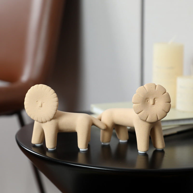 Modern sand-tone ceramic lion figurines for New Chinese shelf and console decor