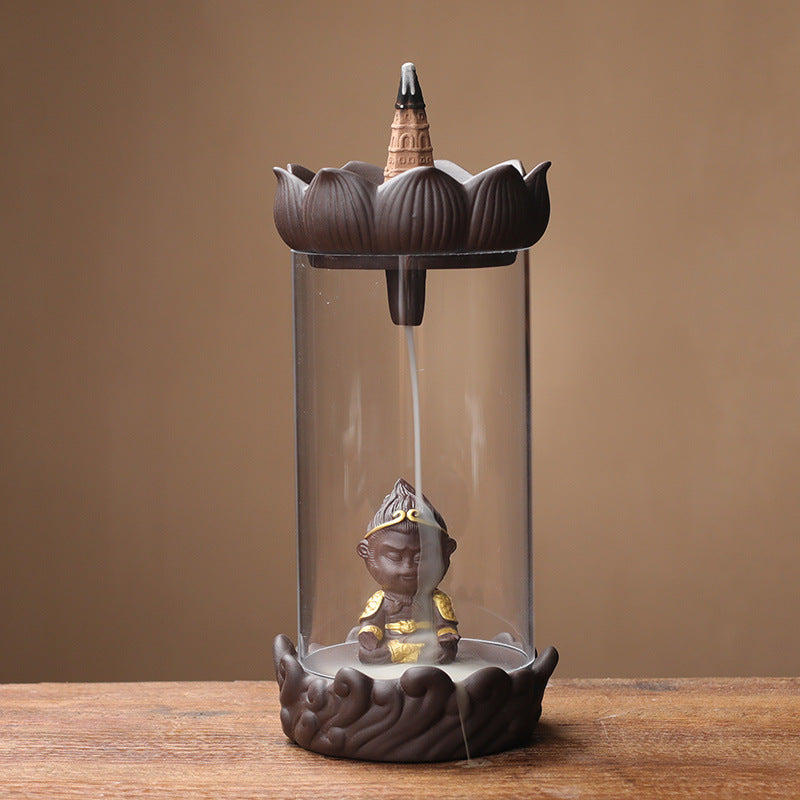 Lotus-top clear acrylic backflow incense burner with Monkey King figure and gold staff