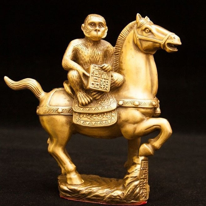 Monkey riding horse copper-tone sculpture symbolizing immediate promotion in Chinese culture