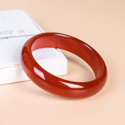 Certified natural red agate bangle close view showing translucent red tone