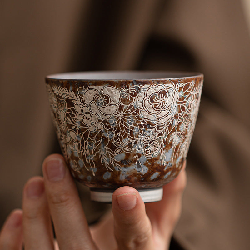 Handheld old rock clay floral silver-accent Gongfu tea cup