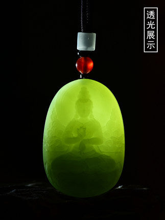 Hetian jade Guanyin pendant translucency under light