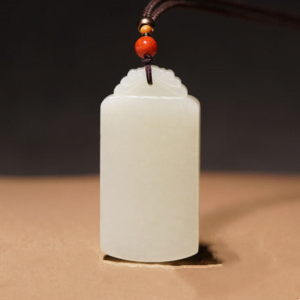 Natural white Hetian jade Wushi Pai pendant on cord