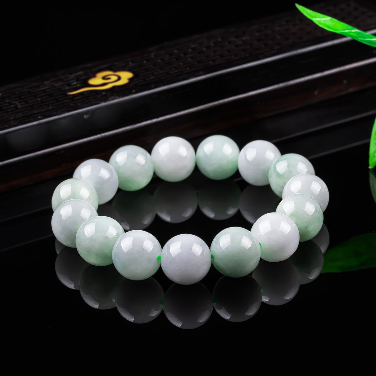 Certified natural Burmese Grade A pale green jadeite 13 mm round bead bracelet