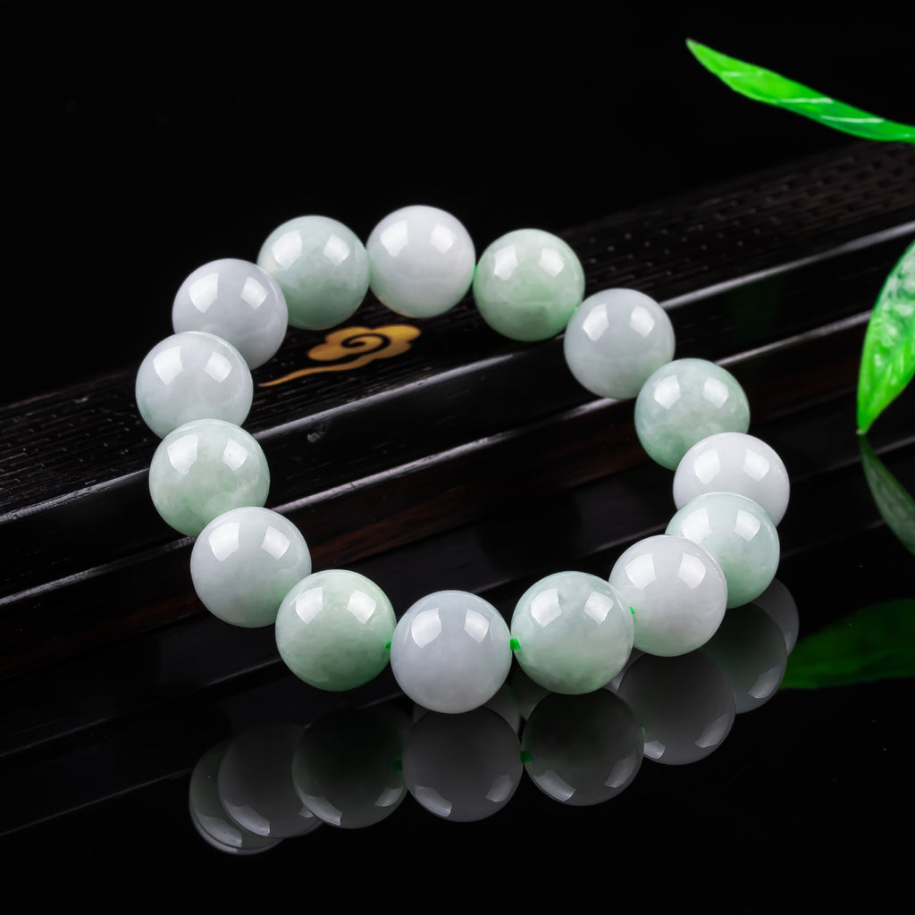 Natural pale green Burmese jadeite bracelet with 13 mm beads