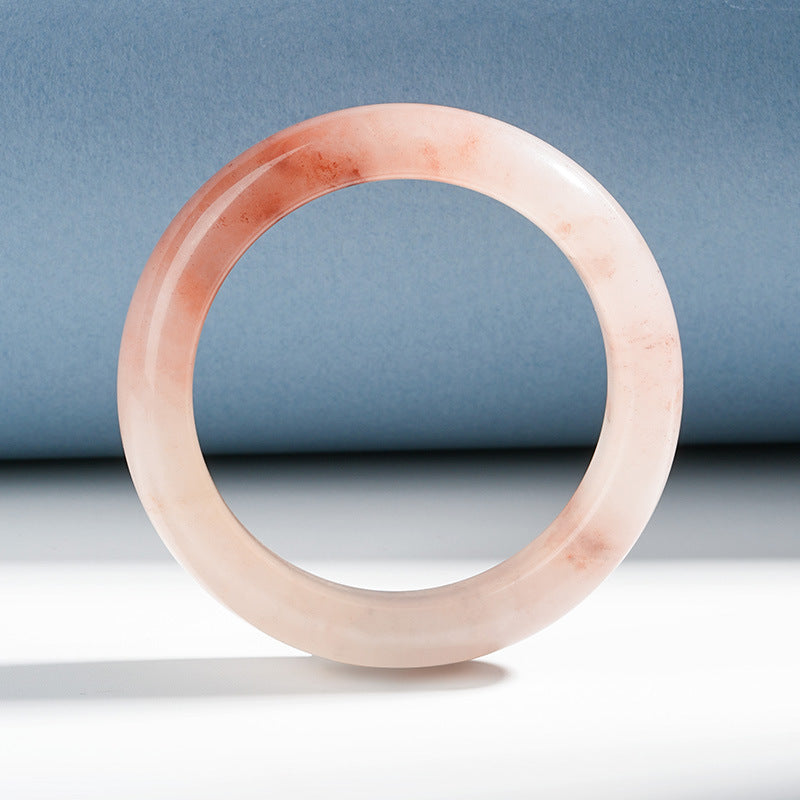 Certified natural peach quartzite bangle in soft coral pink