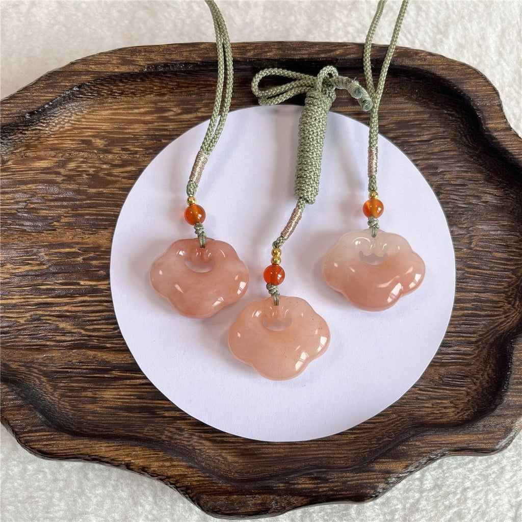 Peach-tone natural stone Ruyi lock pendant trio