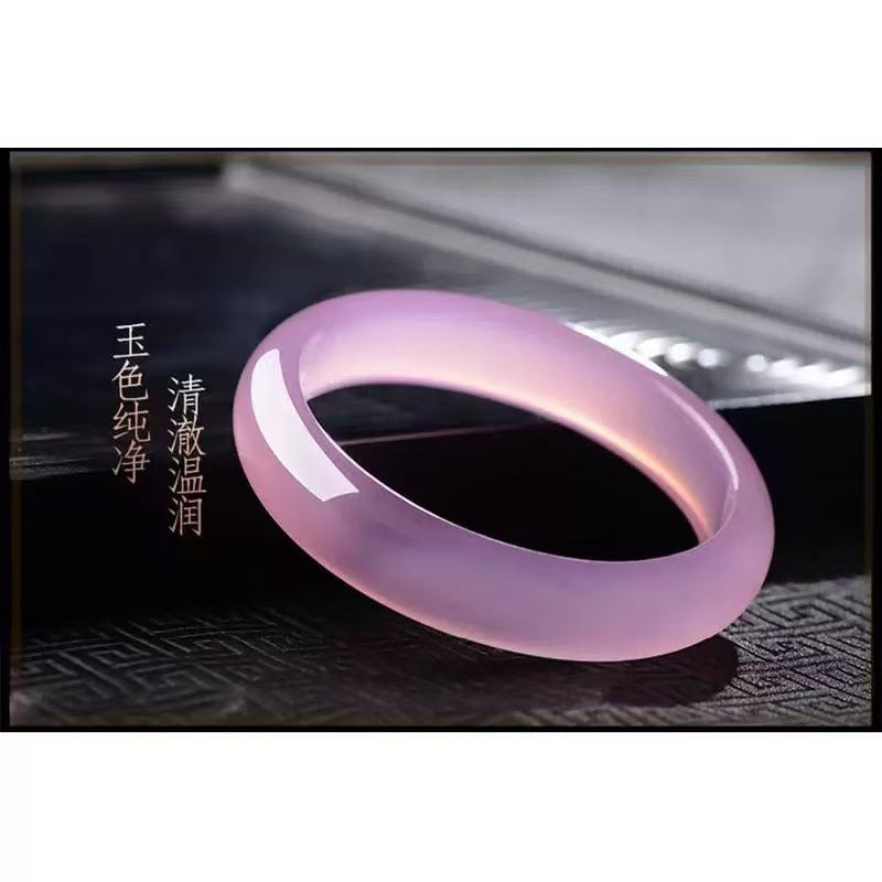 Natural pink chalcedony bangle styled on wrist