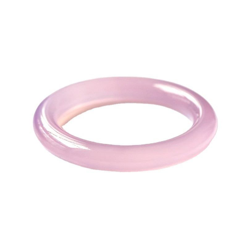 Translucent blush pink chalcedony bangle polished close-up