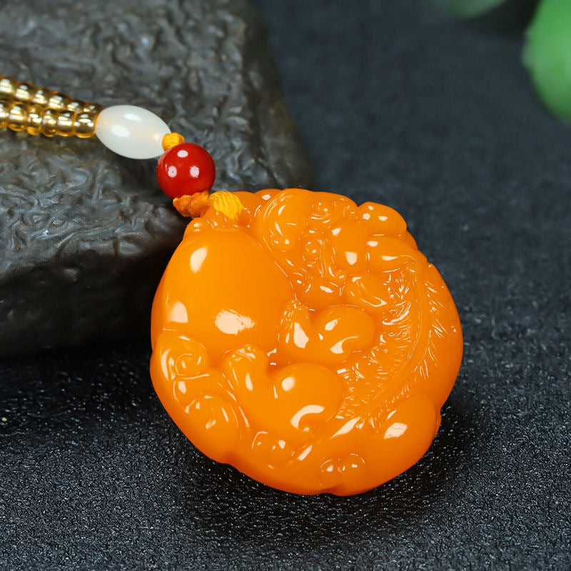 Chinese Pixiu round pendant with white and red bead accents