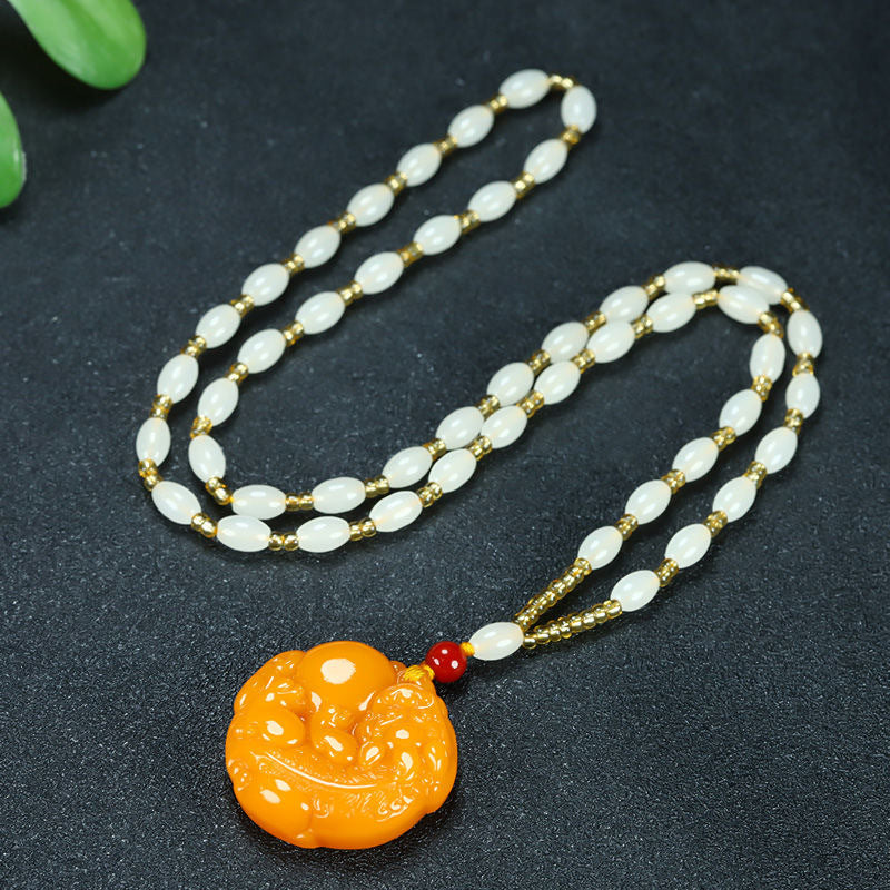 Golden orange Pixiu pendant necklace with long bead cord