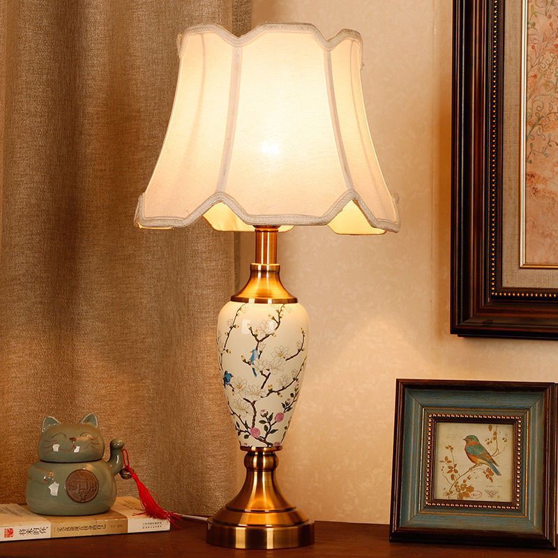 New Chinese porcelain table lamp with magnolia branch pattern and scalloped fabric shade