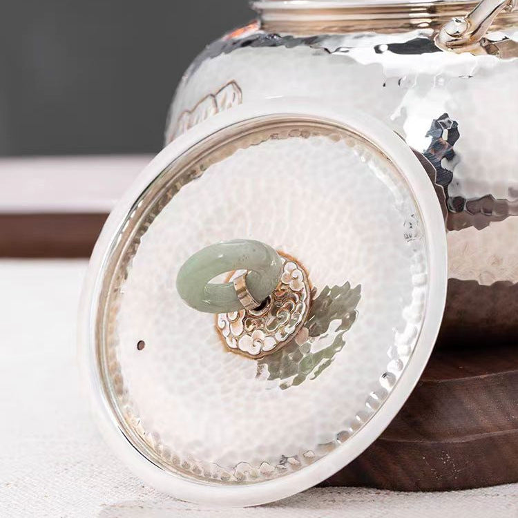 Handcrafted pure silver tea kettle detail