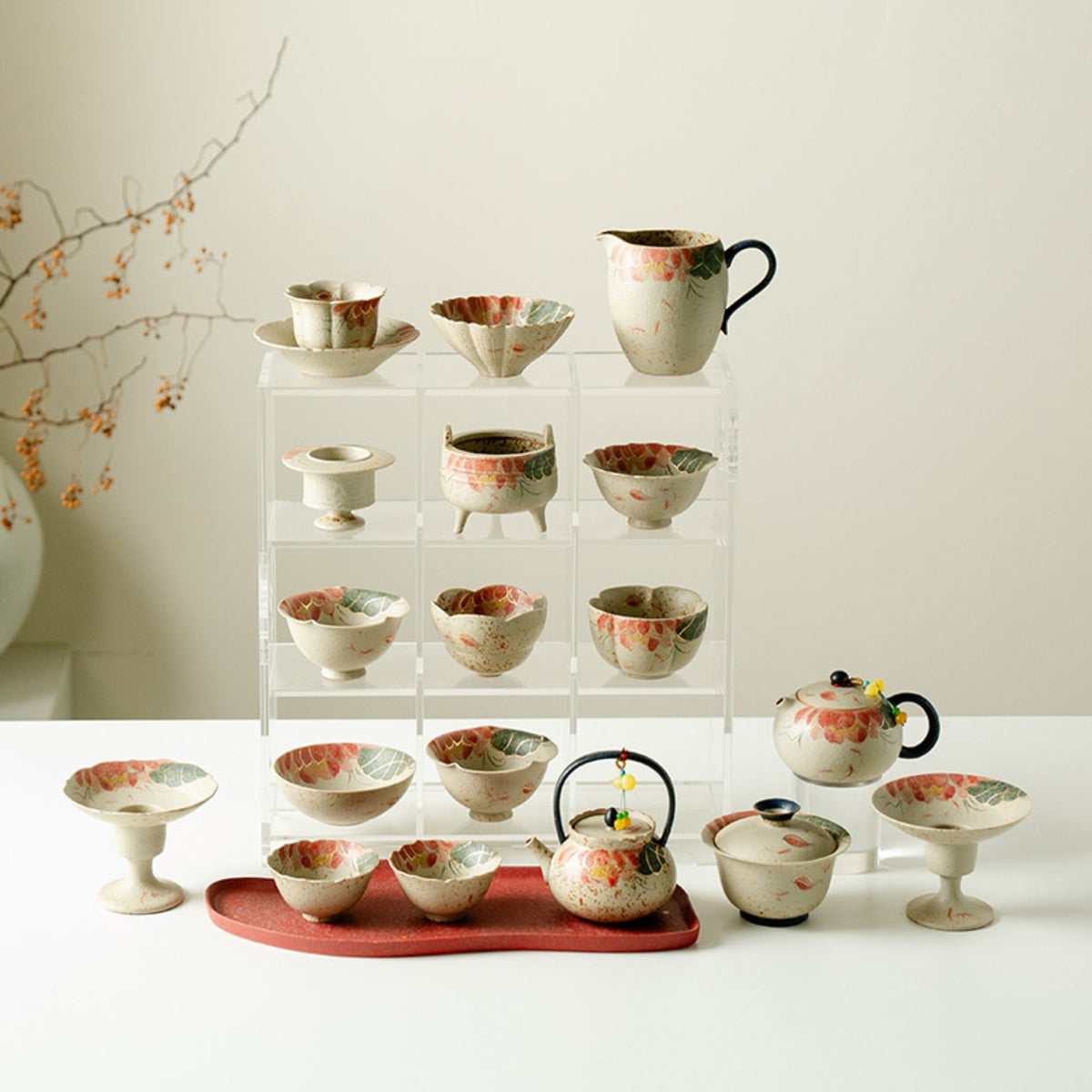 Hand-painted red koi and lotus ceramic teaware collection with matching cups, gaiwan, pitchers and teapots