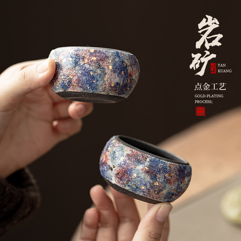 Rock mineral texture ceramic Zen Gongfu tea cup with multicolor glaze and gold speck accents