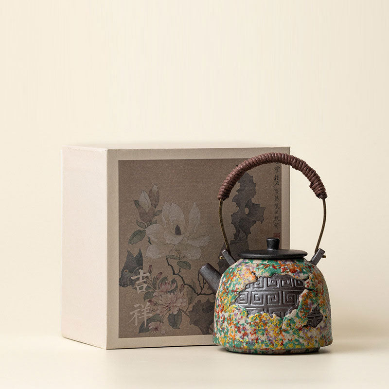 Rock-painting glaze ceramic tea kettle with woven bail handle and geometric meander relief