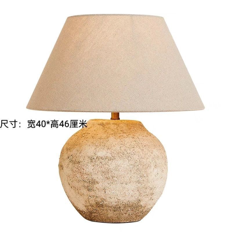 Round stone-texture ceramic lamp approximately 46 cm high and 40 cm wide
