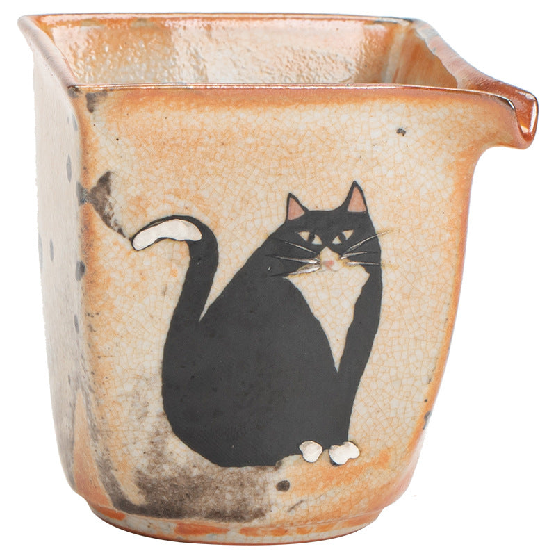 Square-spout Shino-style ceramic tea pitcher with hand-painted black cat motif