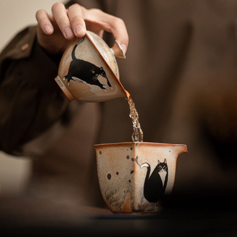 Retro Shino ceramic Gongfu gaiwan with playful black cat motif and hand-painted detail