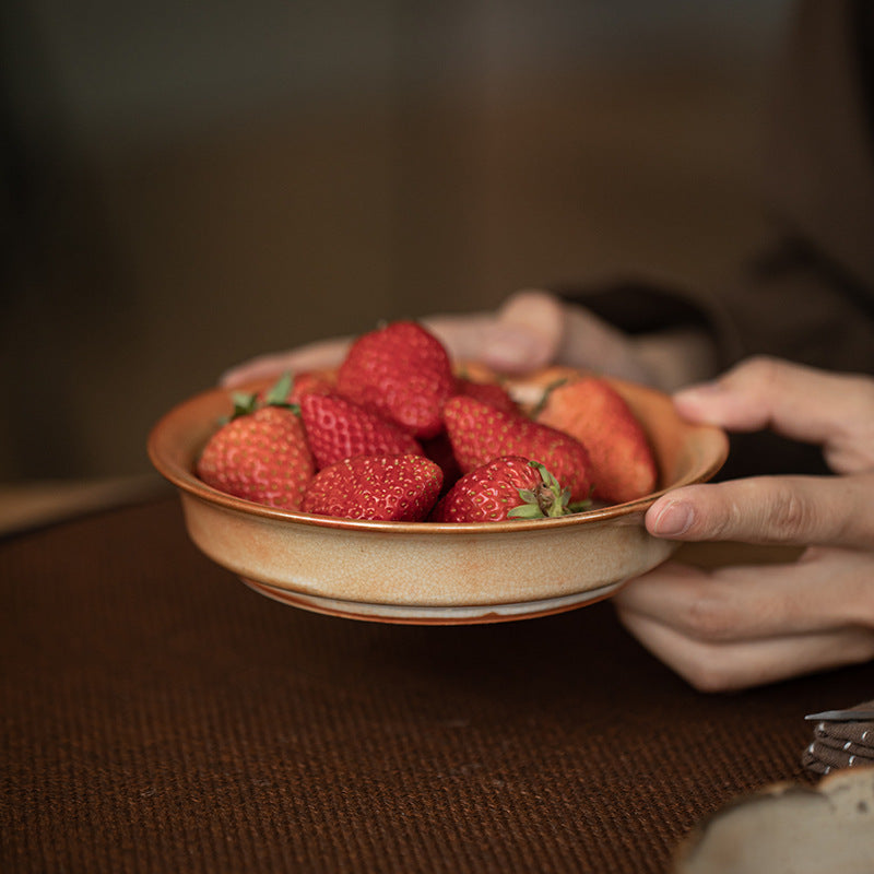 Shino-style ceramic black cat serving plate with strawberries
