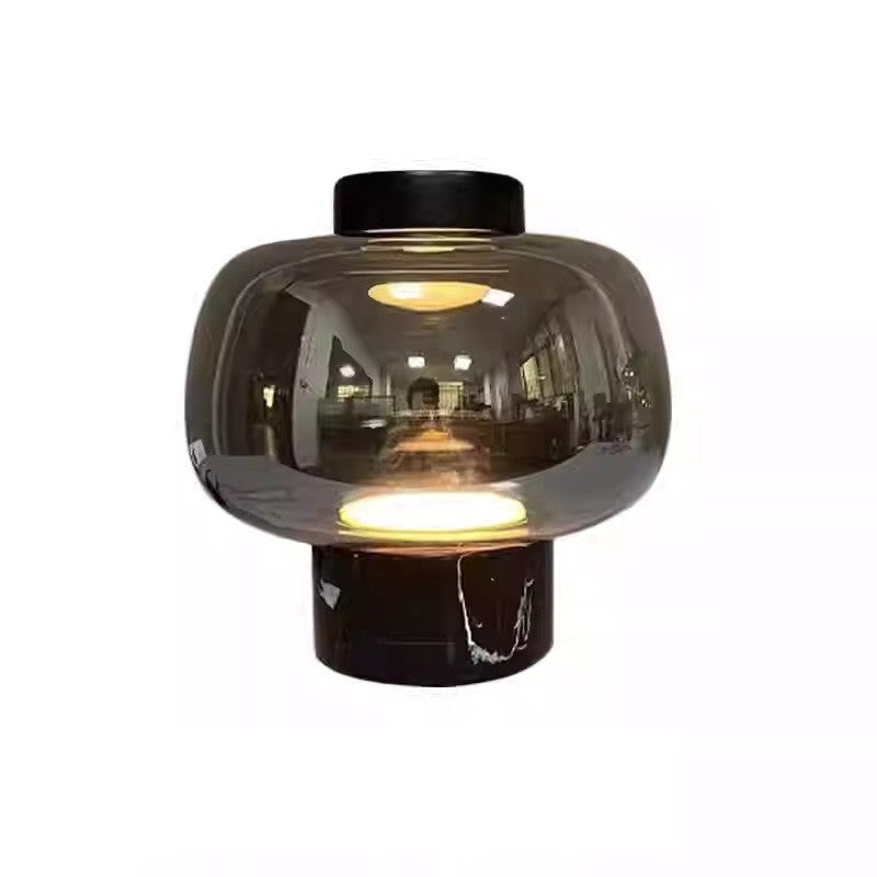 Smoke grey glass and black marble ambient table lamp product view