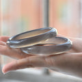 Certified smoky gray chalcedony bangle pair with translucent polished finish